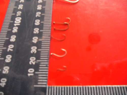 APPROXIMATELY 1500 SMALL MUSTAD AND TRIDENT FISHING HOOKS (NEVER BEEN USED)